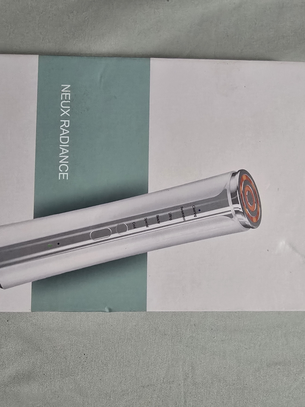 Neux Radiance Facial Device - Silver with Orange Accent